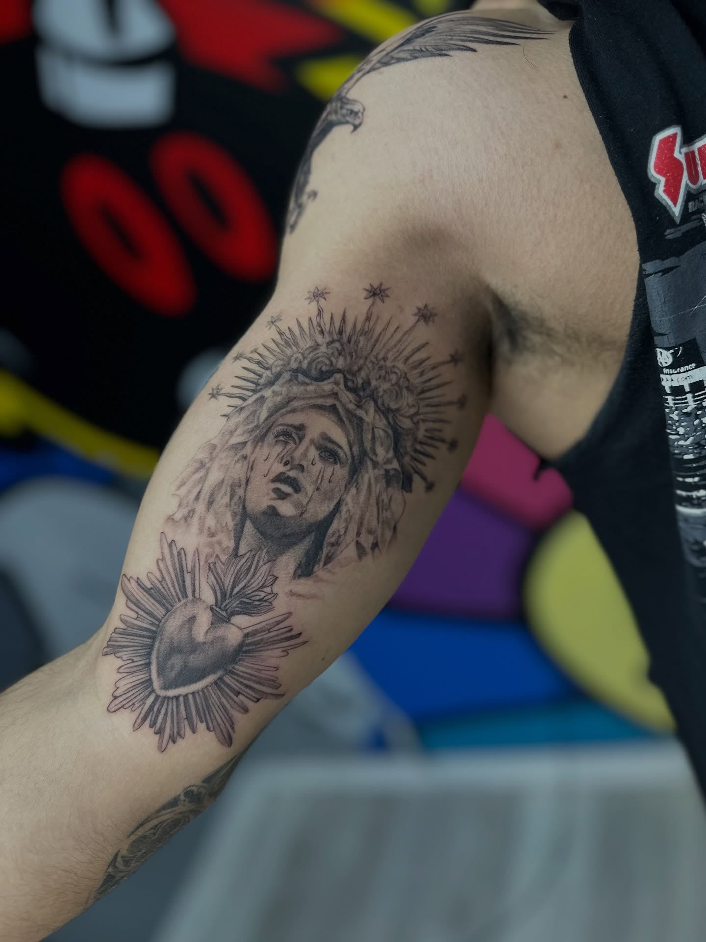 Religious figure black and grey tattoo on the forearm by Antonio