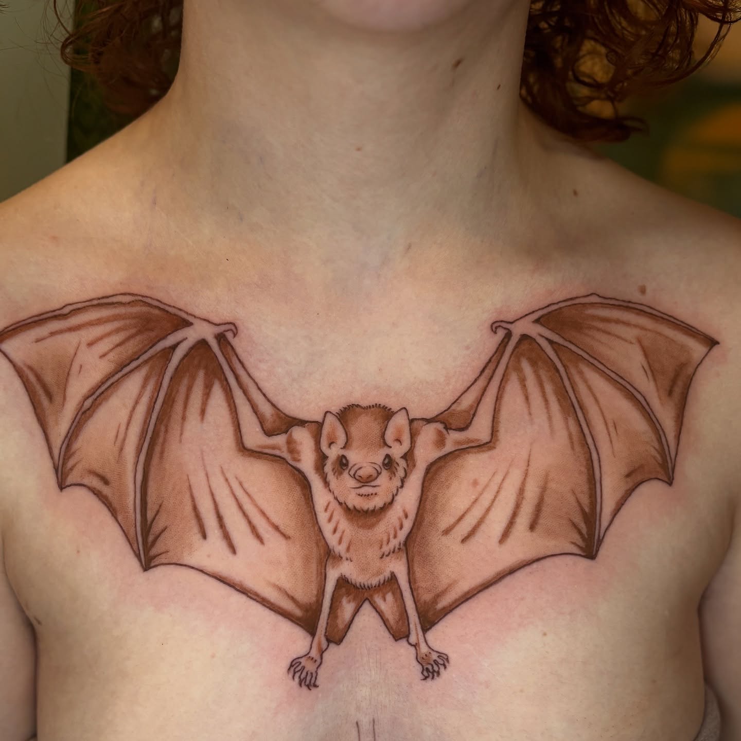 Bat black and grey tattoo on the chest by Sarah Lupo, Millbury, Massachusetts