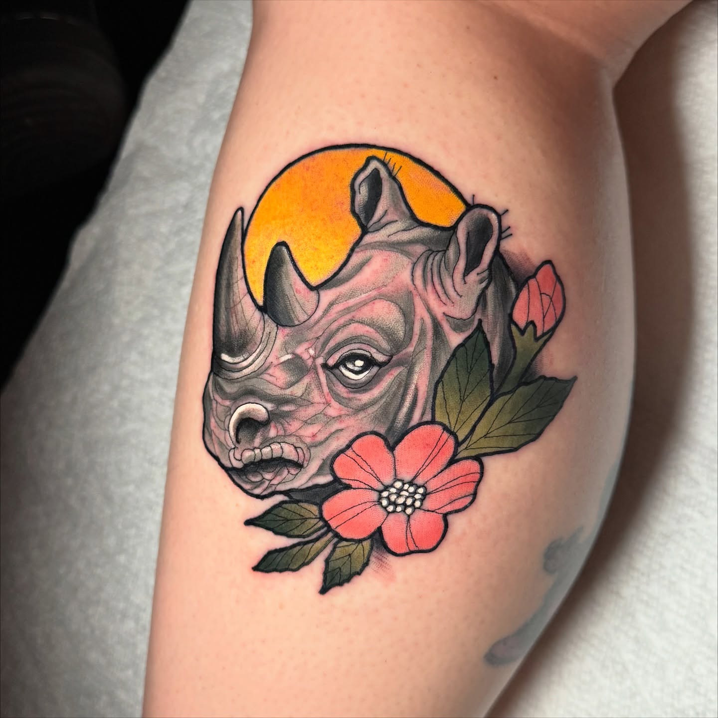 Rhino and flowers realism tattoo on the forearm by ๐ ๐ต๐๐๐๐๐ ๐ฎ๐๐๐๐๐๐๐๐๐