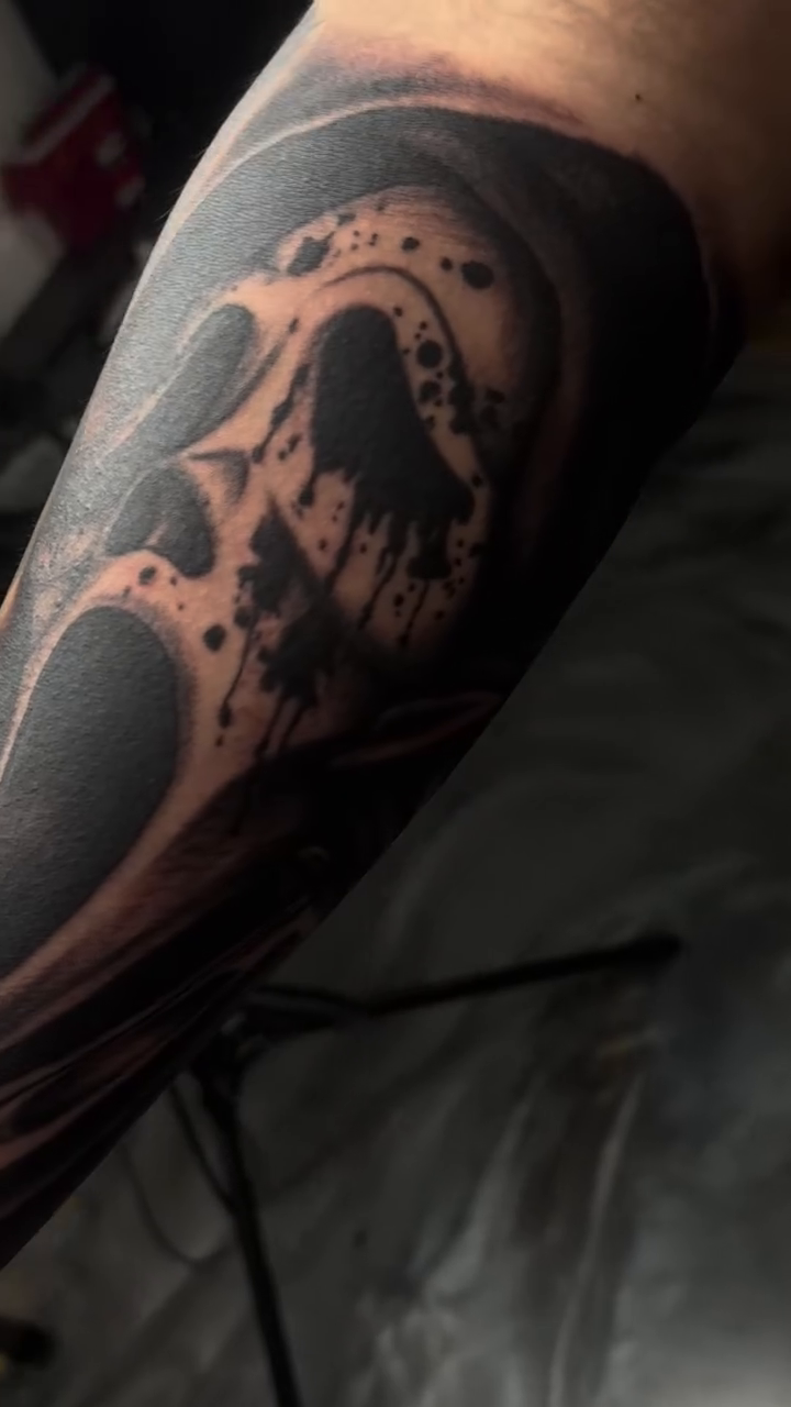 Scream mask realism tattoo by Kevin