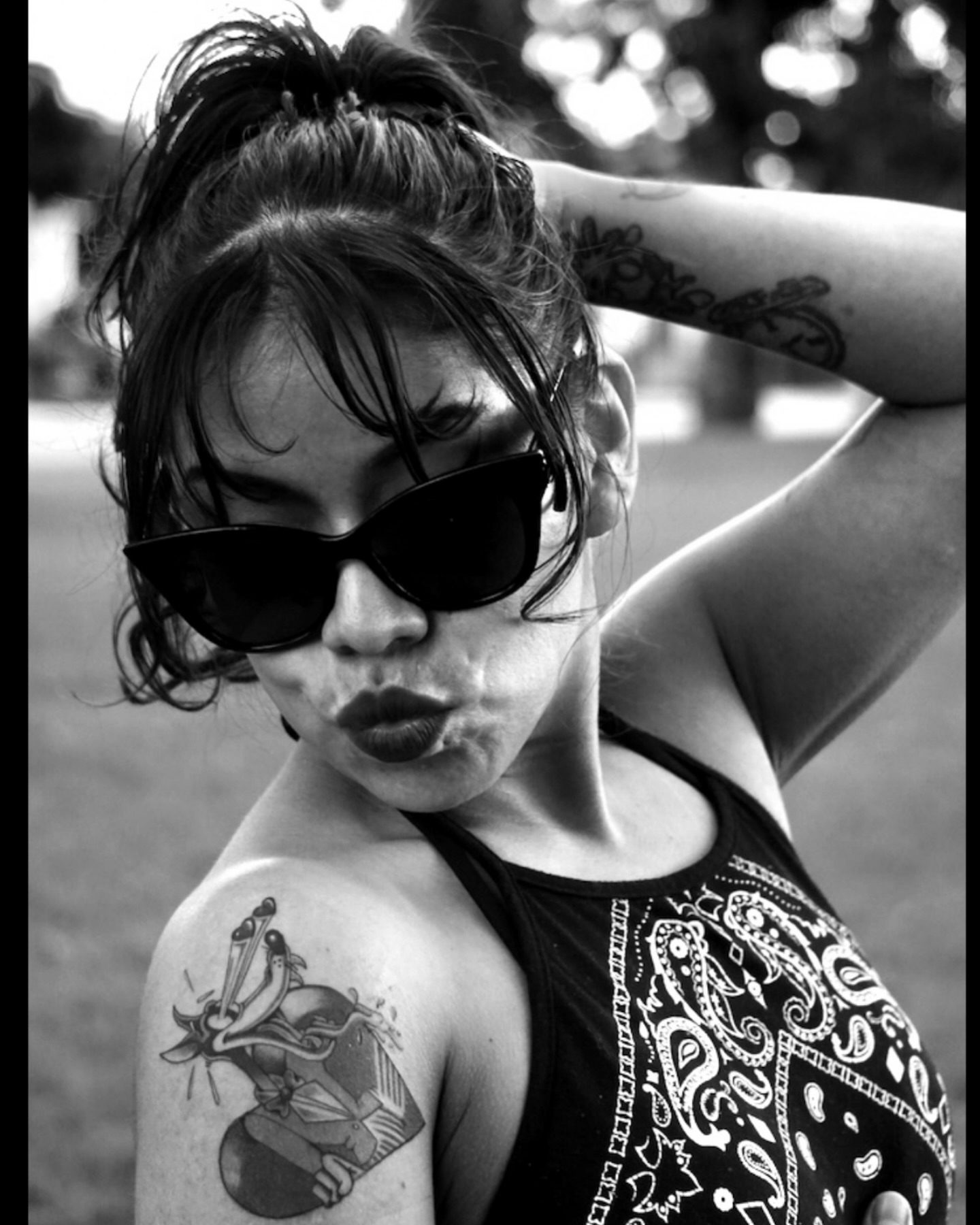 Woman black and grey tattoo on the shoulder by Chato