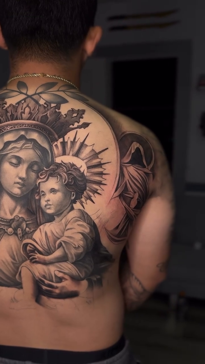 Virgin Mary and child realism tattoo by Isiah Hall, Whittier, California