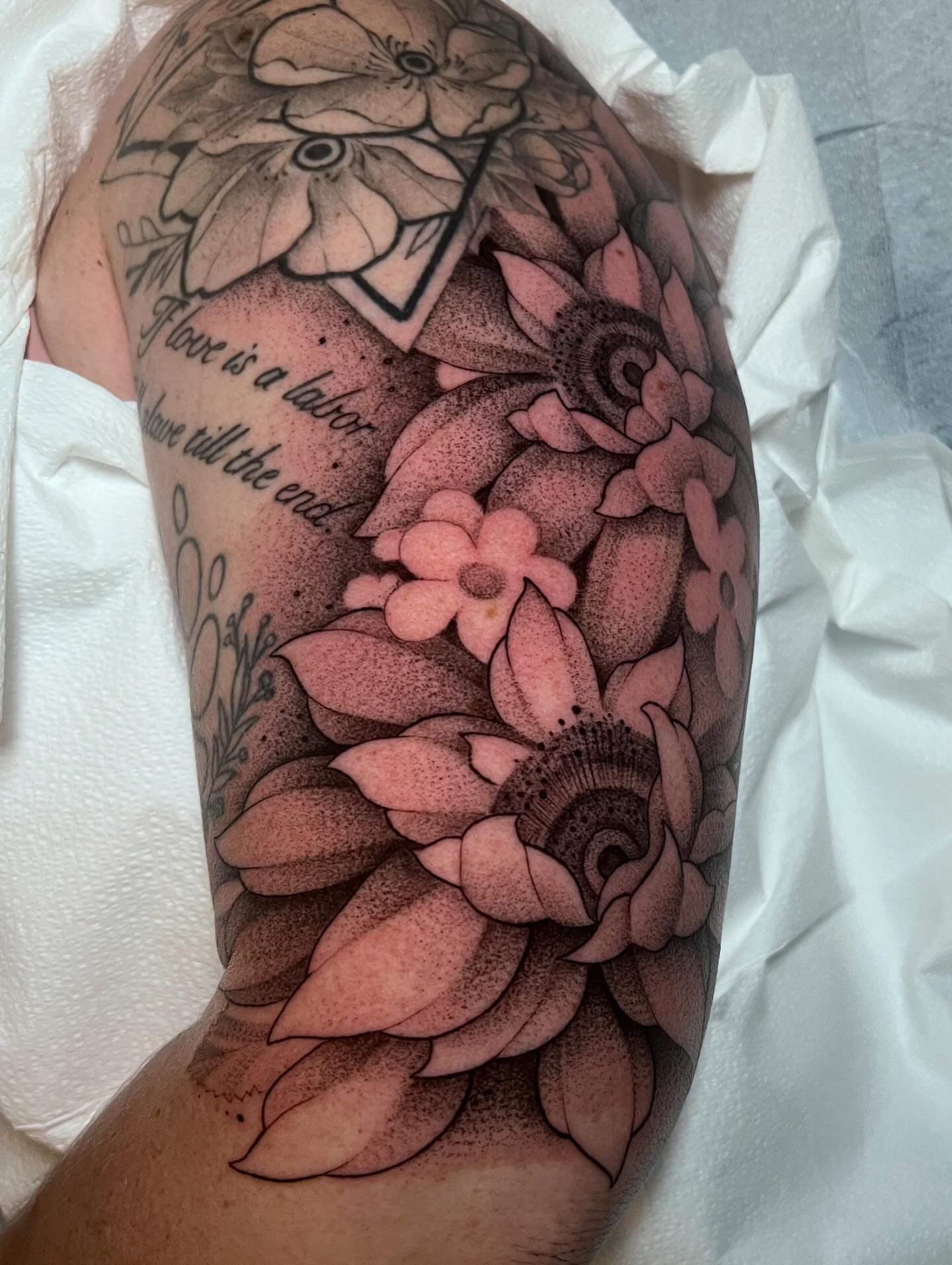 Flowers and quote dotwork tattoo on the forearm by Anna Wolff, Richmond, Virginia