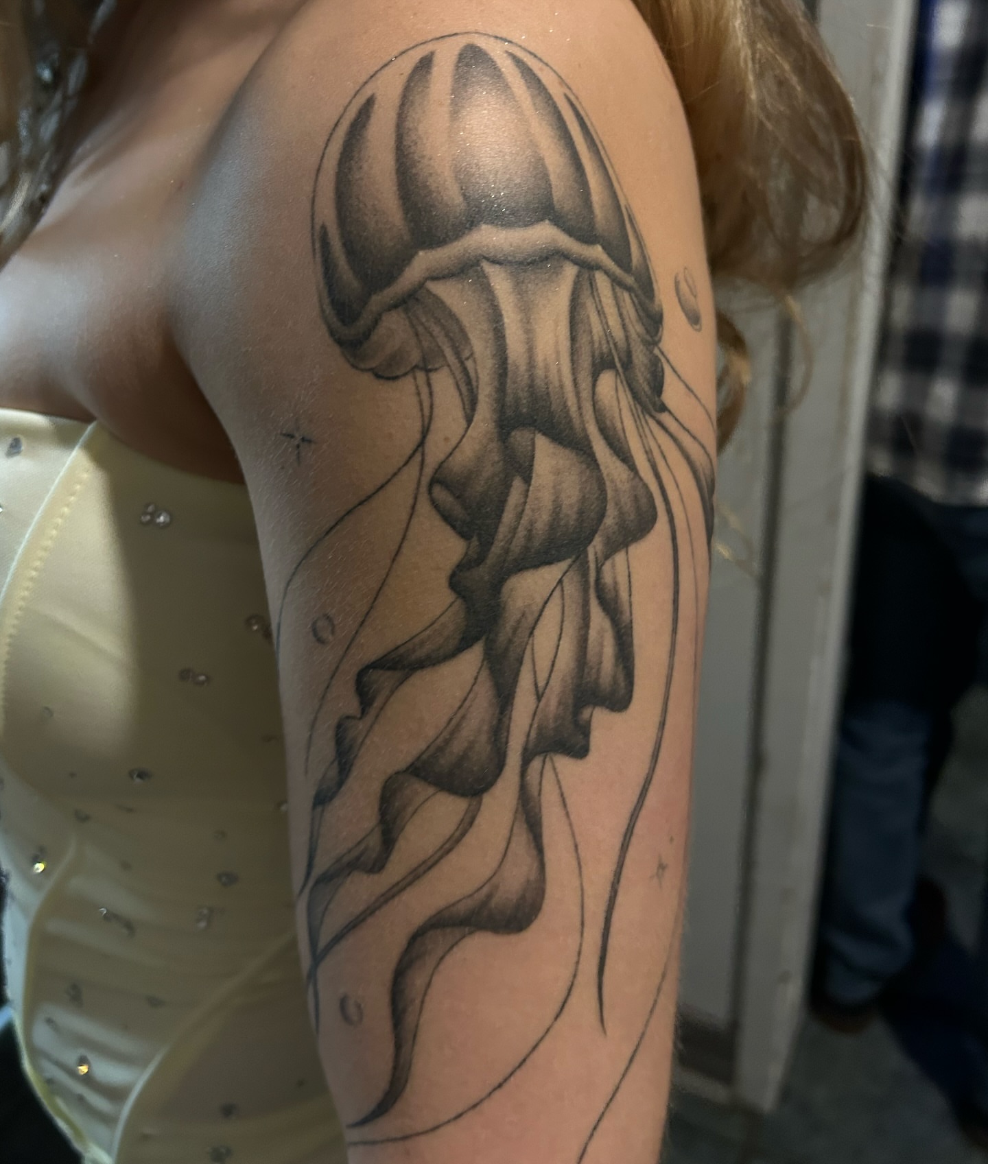Jellyfish realism tattoo on the upper arm by alyssa jade ⭐️