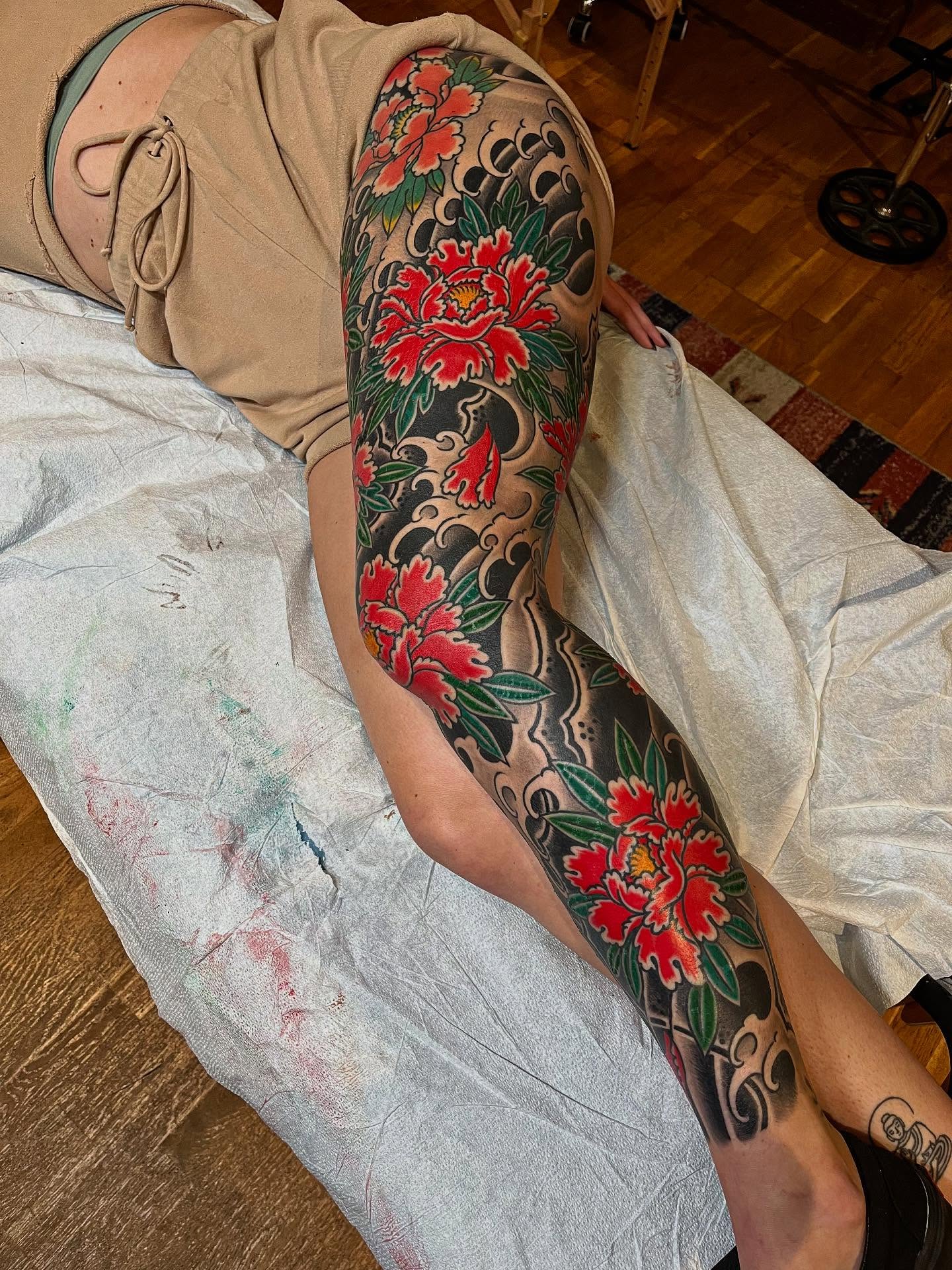 Peony flowers japanese irezumi tattoo on the forearm by Graham Niles