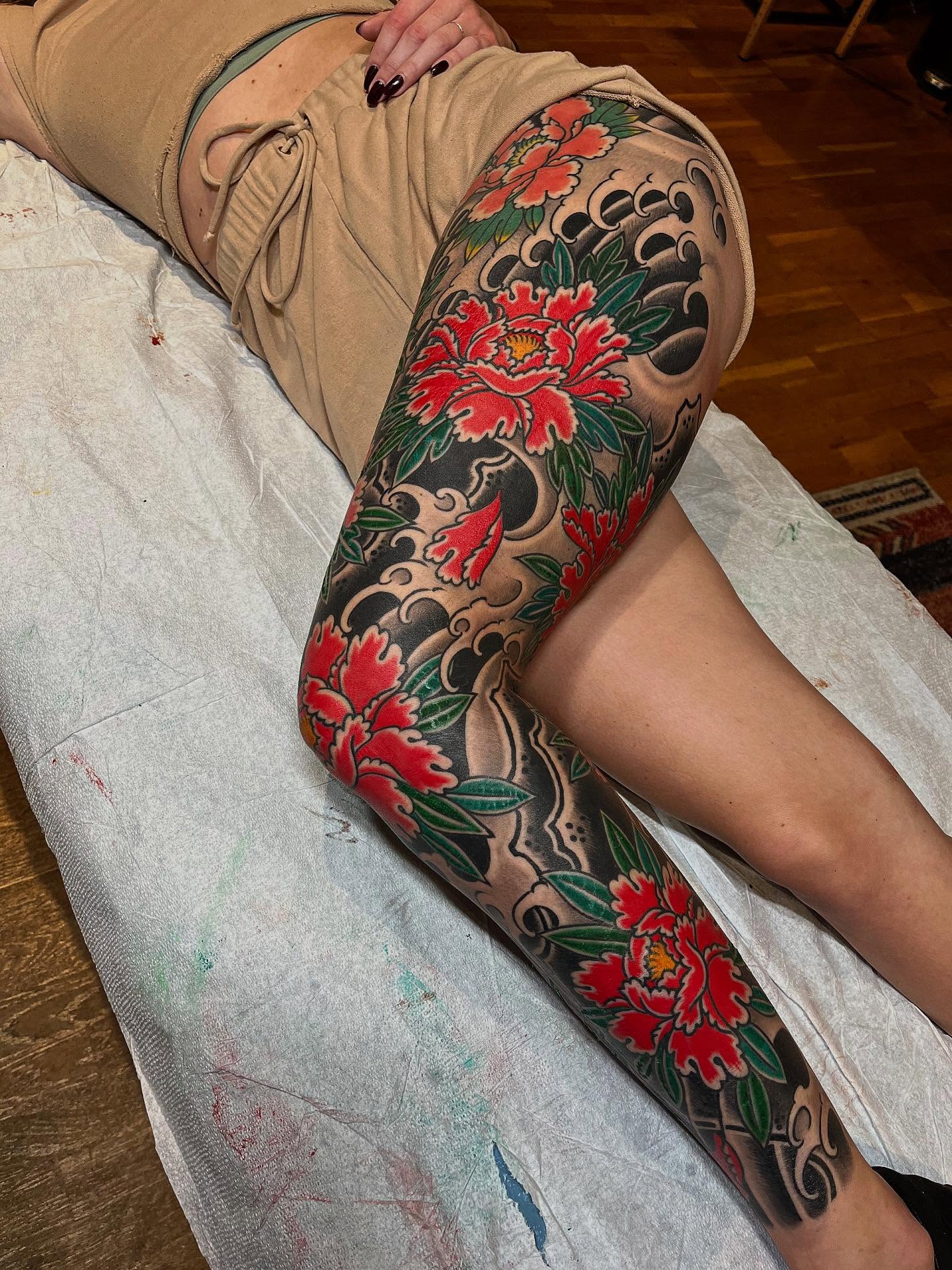 Peony flowers japanese irezumi tattoo on the thigh by Graham Niles