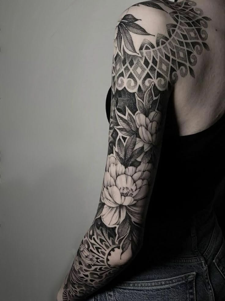 Tattoo by @romanova.skinart — black_and_grey, dotwork