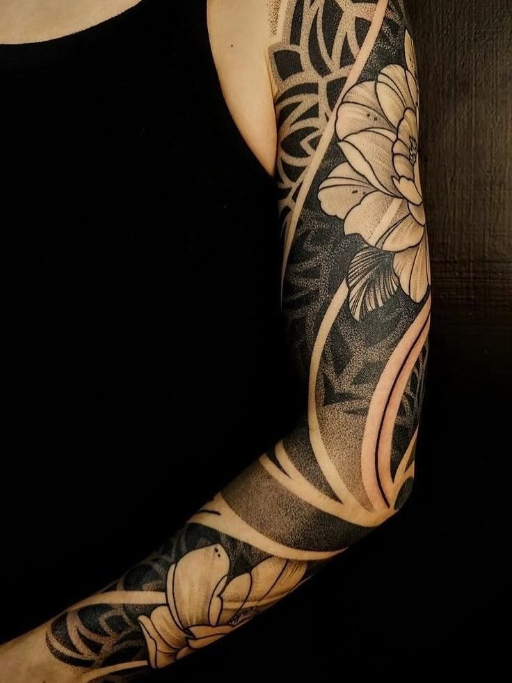Tattoo by @romanova.skinart — black_and_grey