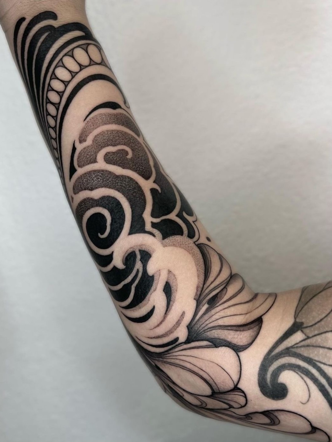 Tattoo by @romanova.skinart — black_and_grey