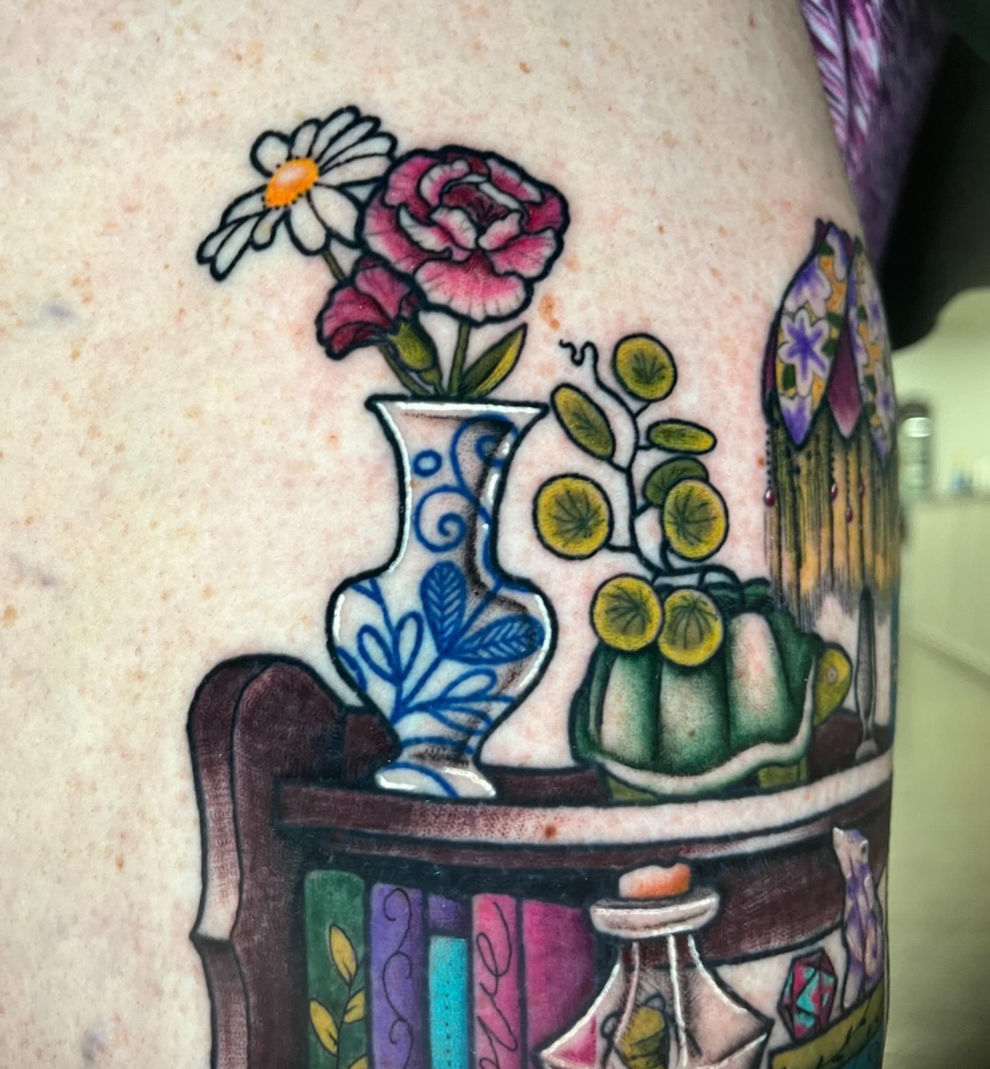 Vase with flowers American traditional tattoo on the forearm by rocky love