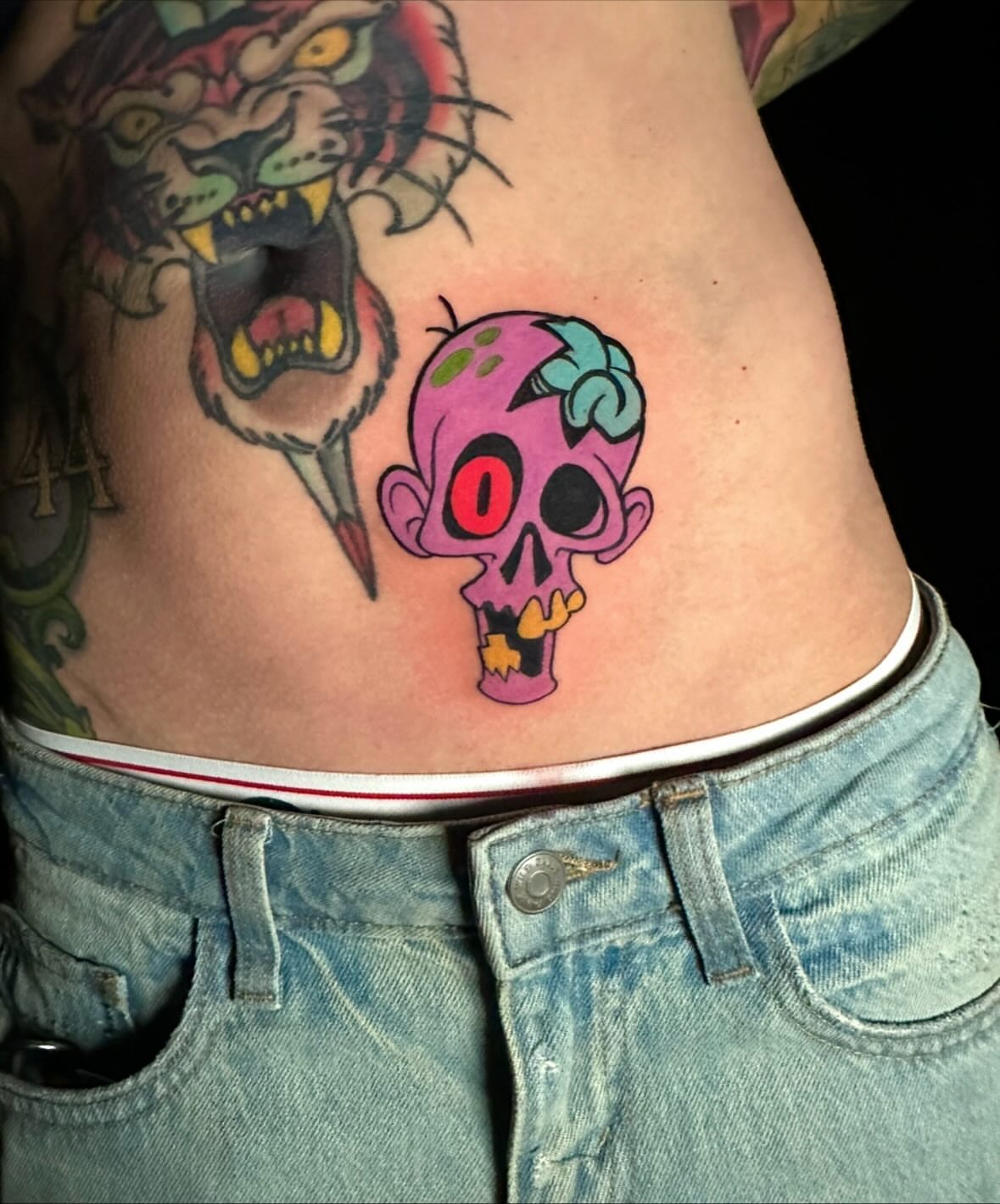 Skull American traditional tattoo on the ribs by Joshua L Wilson, Dayton, Ohio