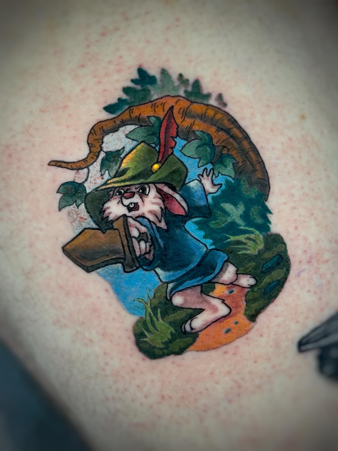Gnome with axe illustrative tattoo on the back by Anna Saveria