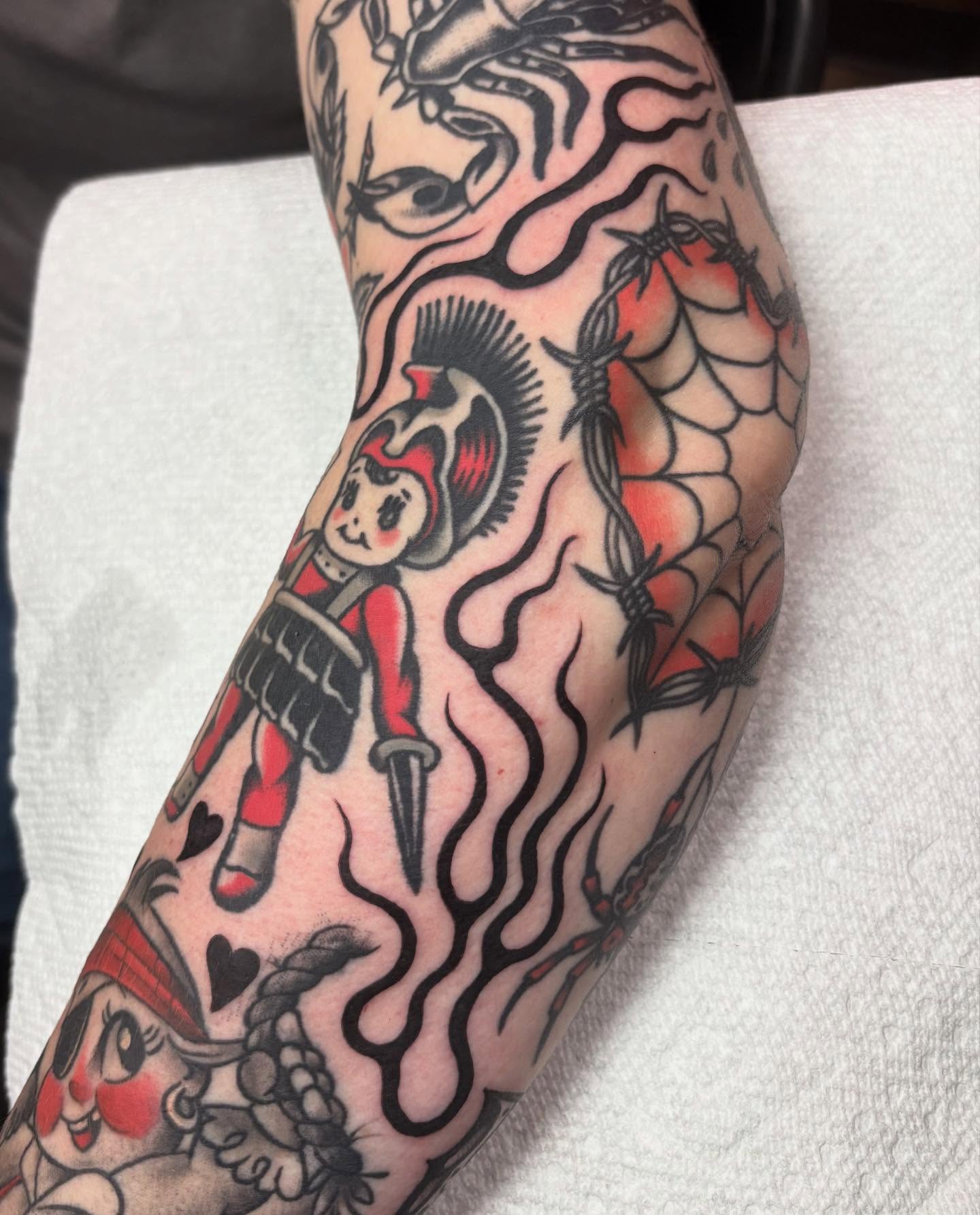 Doll with dagger American traditional tattoo on the forearm by sally ★ lee