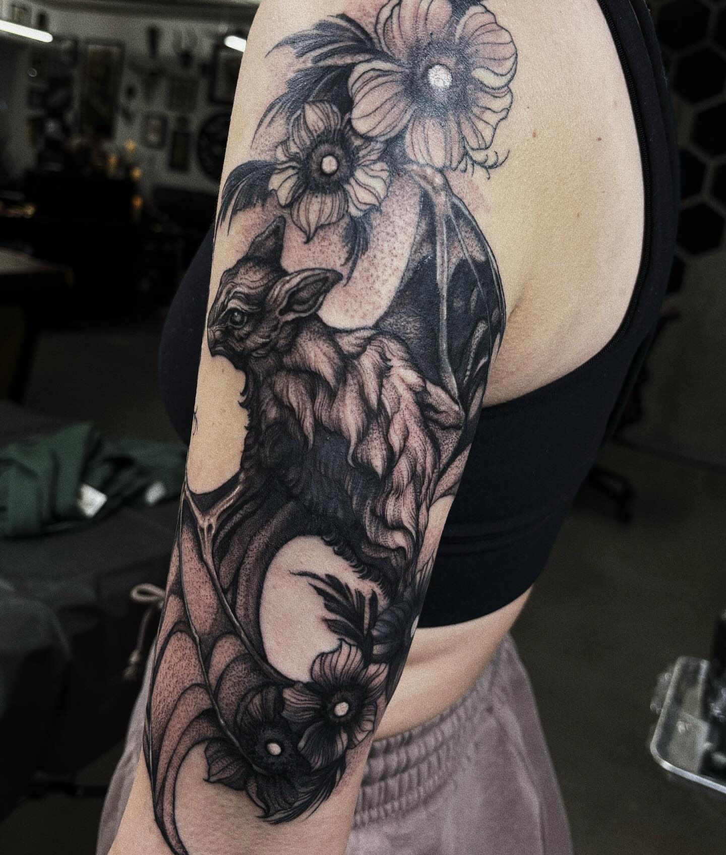 Gothic creature with flowers dark realism tattoo on the forearm by ๐๐ช๐ฒ๐ต๐ฎ๐ ๐๐ช๐ฎ๐ฝ๐