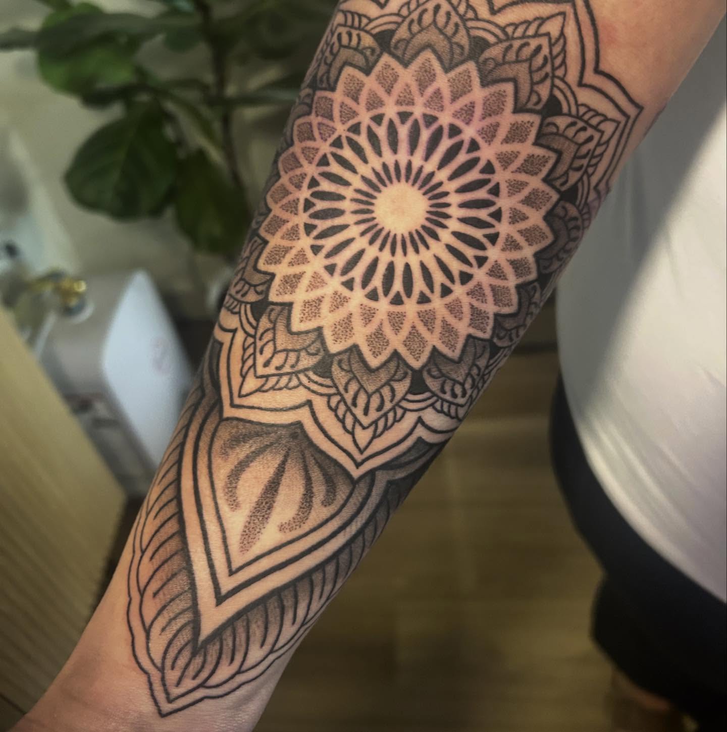 Mandala dotwork tattoo on the forearm by Whitney Harbin