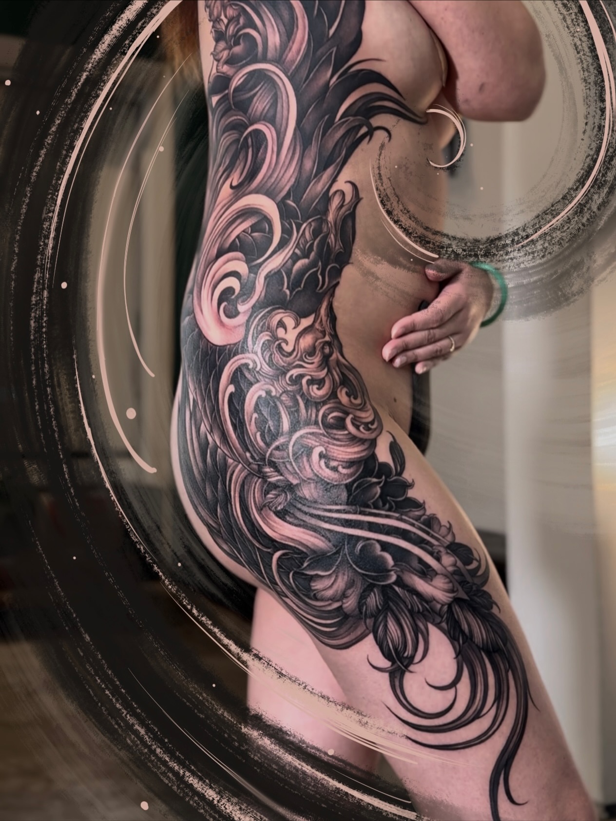 Floral swirls ornamental tattoo on the thigh by Jennal Wang