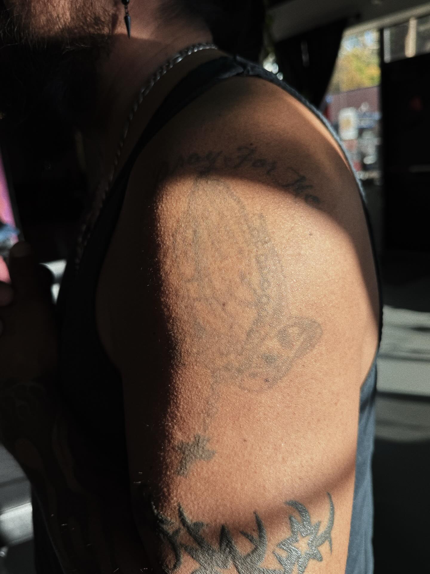 Bird black and grey tattoo on the shoulder by Paulina Vazquez