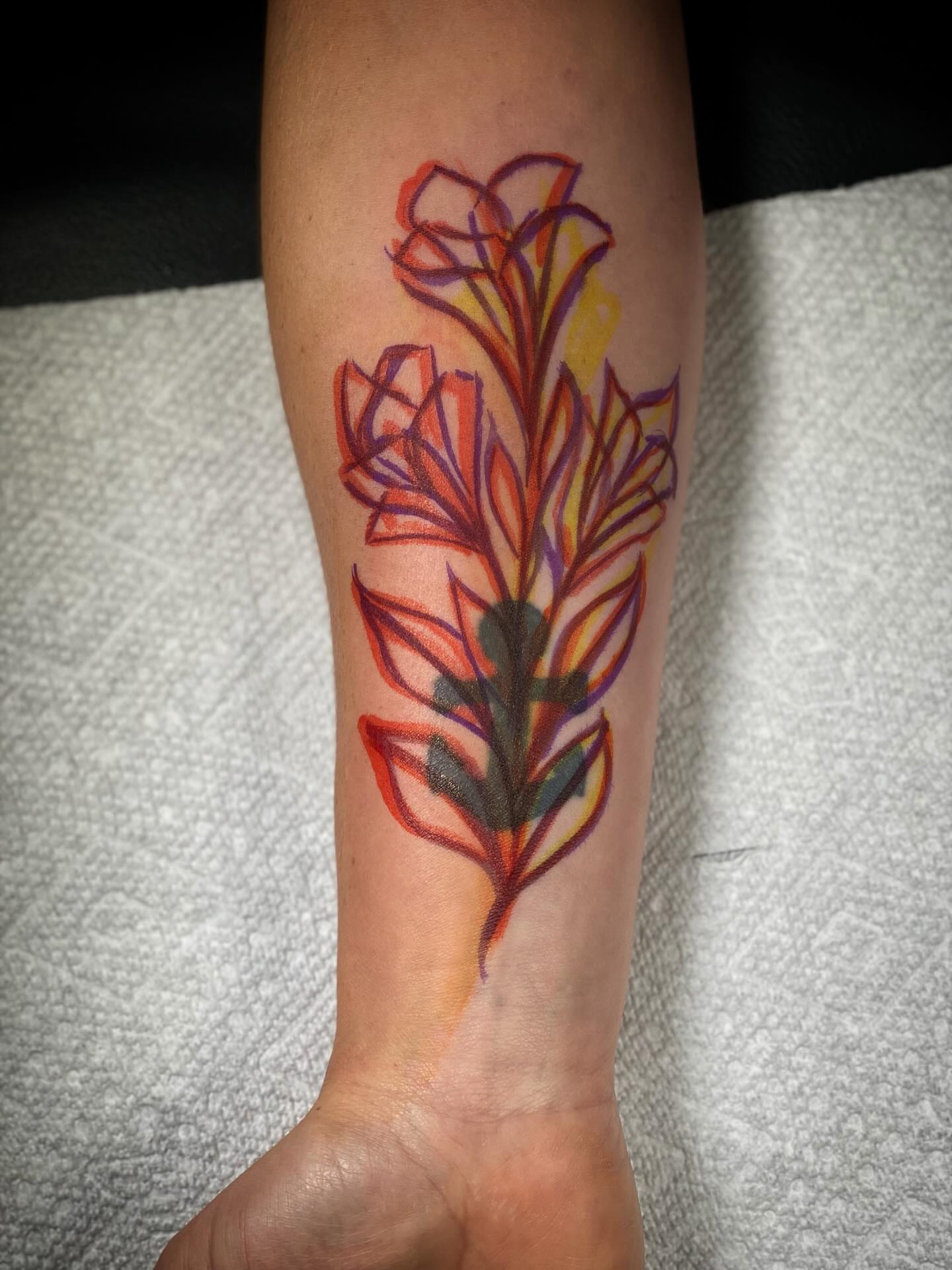 Floral arrangement new school tattoo on the forearm by Chris Klee