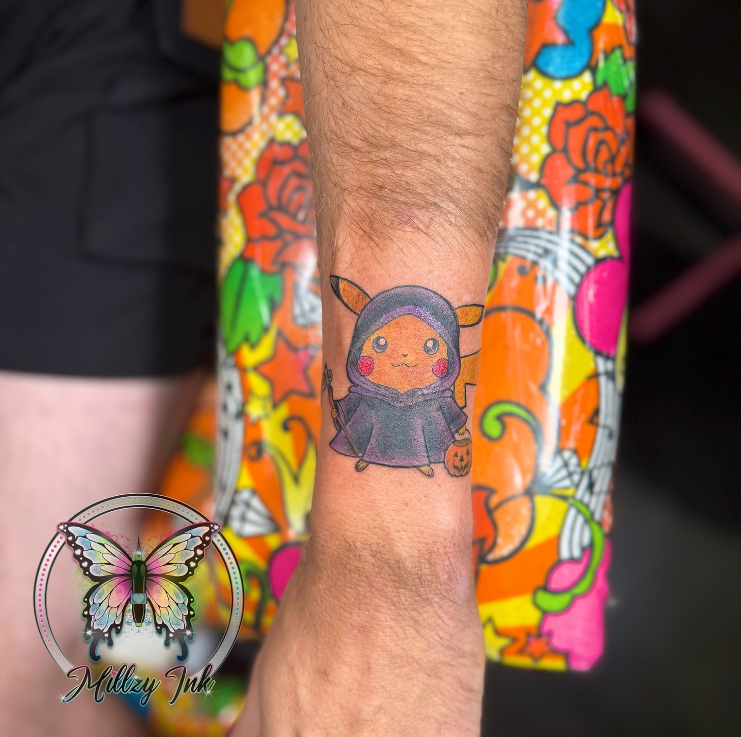Pikachu in a hood dotwork tattoo on the forearm by Your Virginia Tattoo Bestie🫶🏽