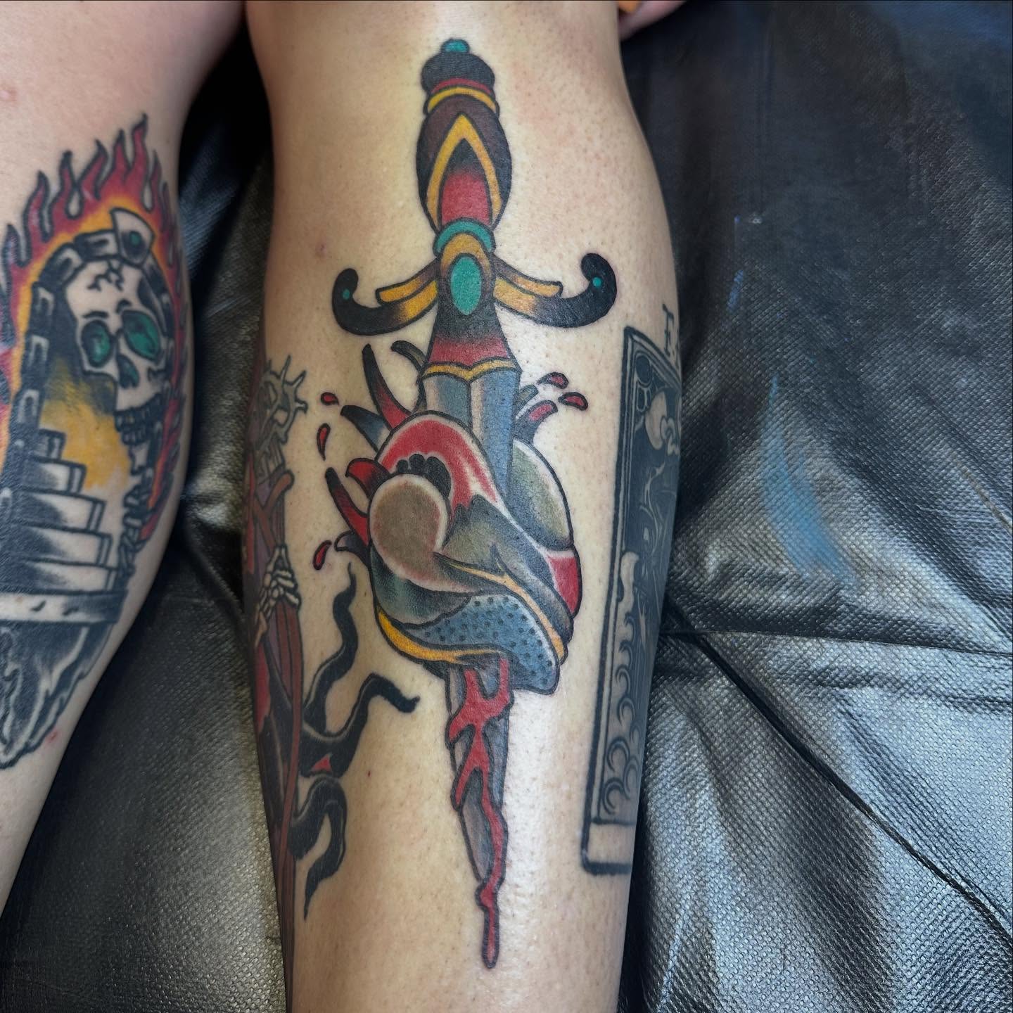Heart pierced by dagger American traditional tattoo on the forearm by Jordan Rubin, Dunedin, Florida