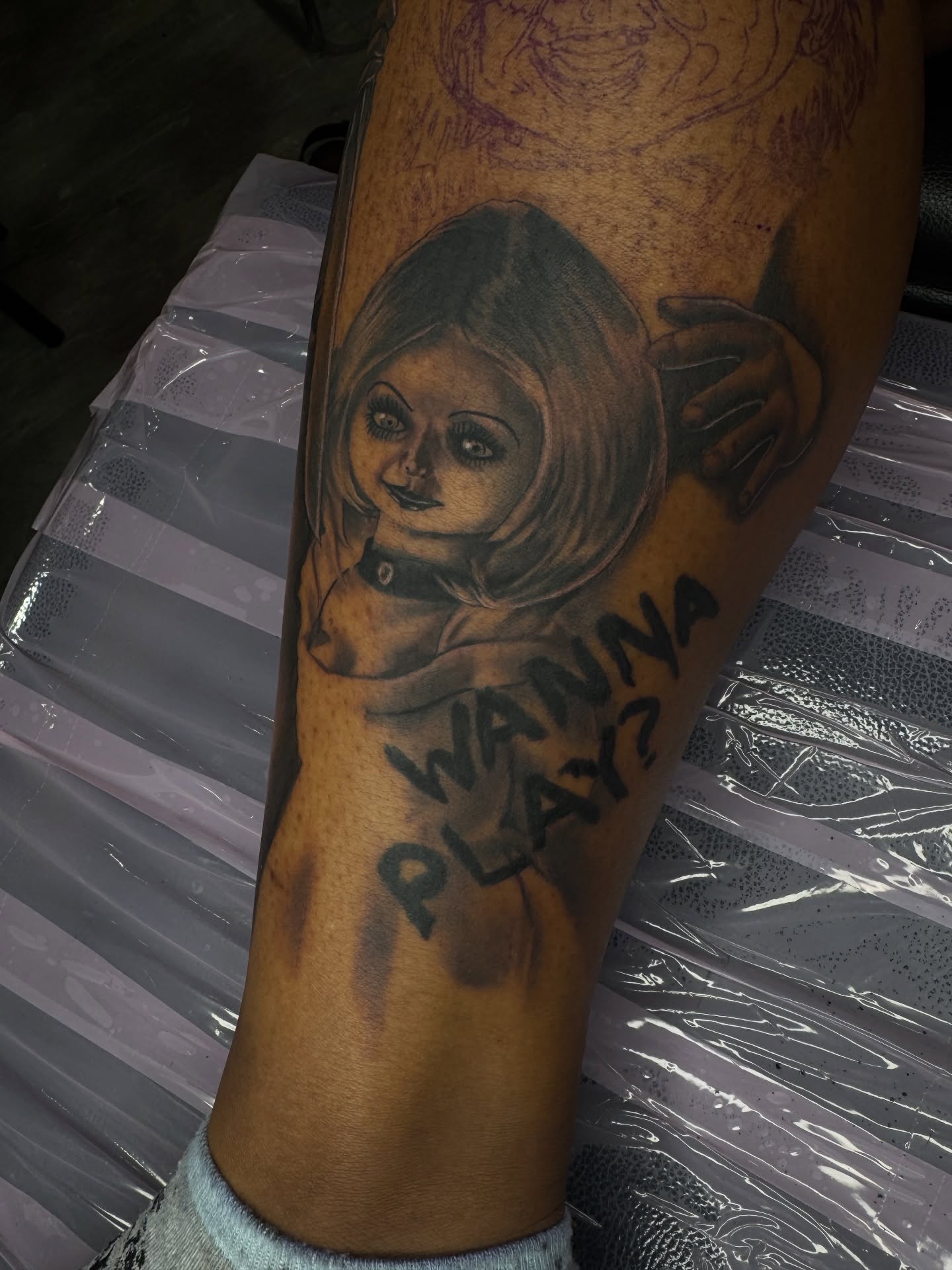 Doll with text black and grey tattoo on the forearm by Visionary🌌