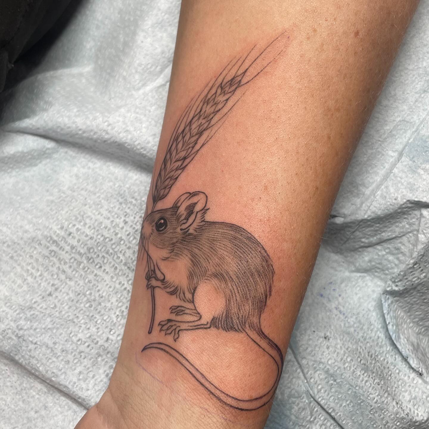 Mouse and wheat realism tattoo on the forearm by Ally Easter, Berkeley, California