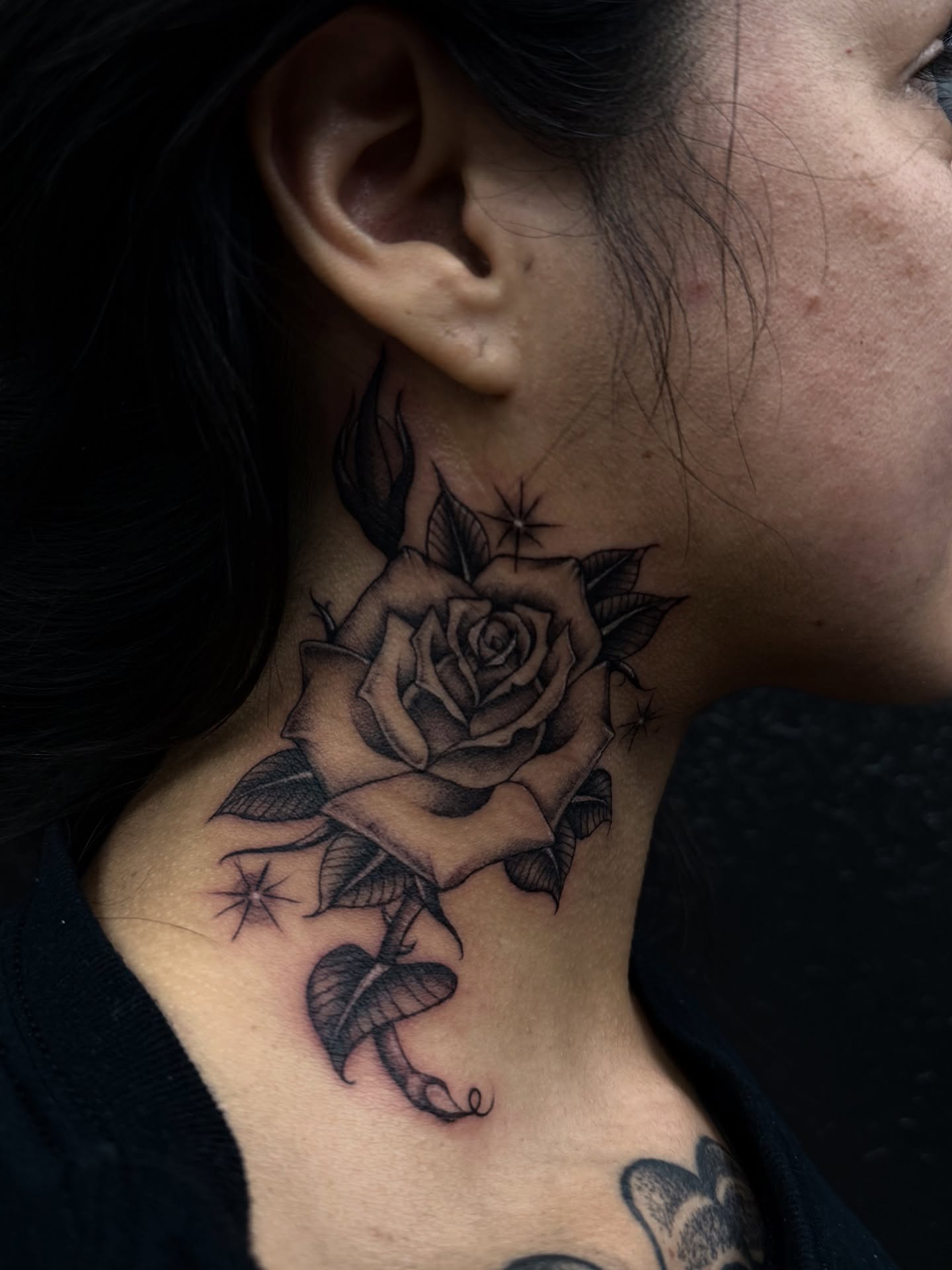 Rose realism tattoo on the neck by dinah