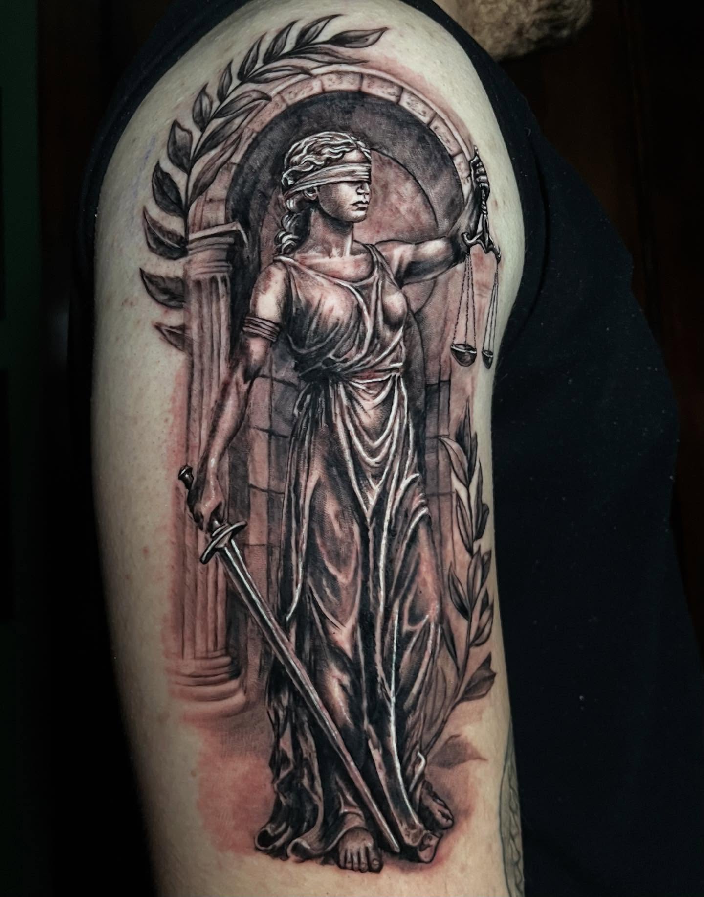 Statue of justice realism tattoo on the upper arm by Lenny Paul - Ohio Tattoo Artist, Canton, Ohio