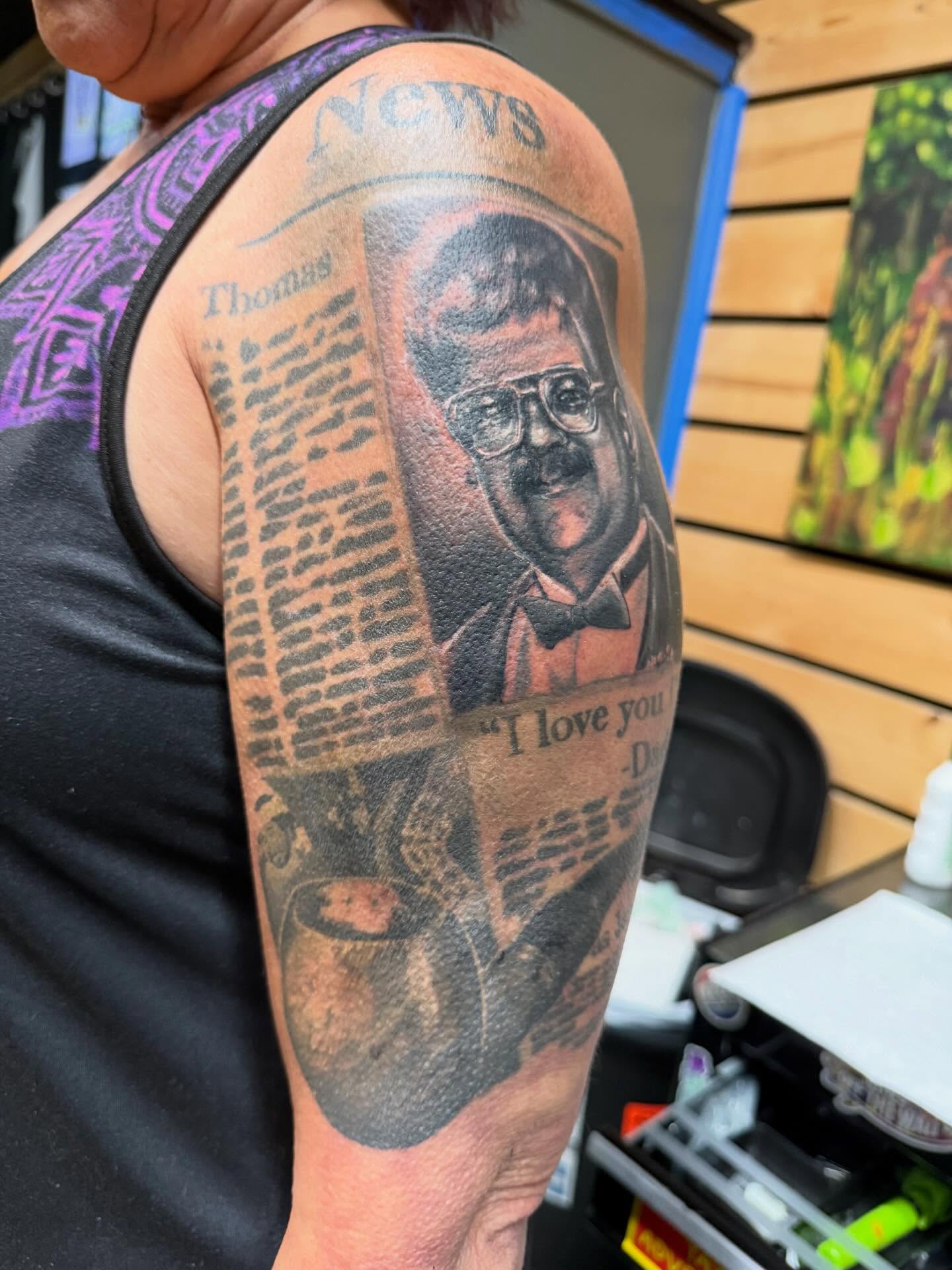 Portrait of man realism tattoo on the forearm by Devon Beyer, Mission, Kansas