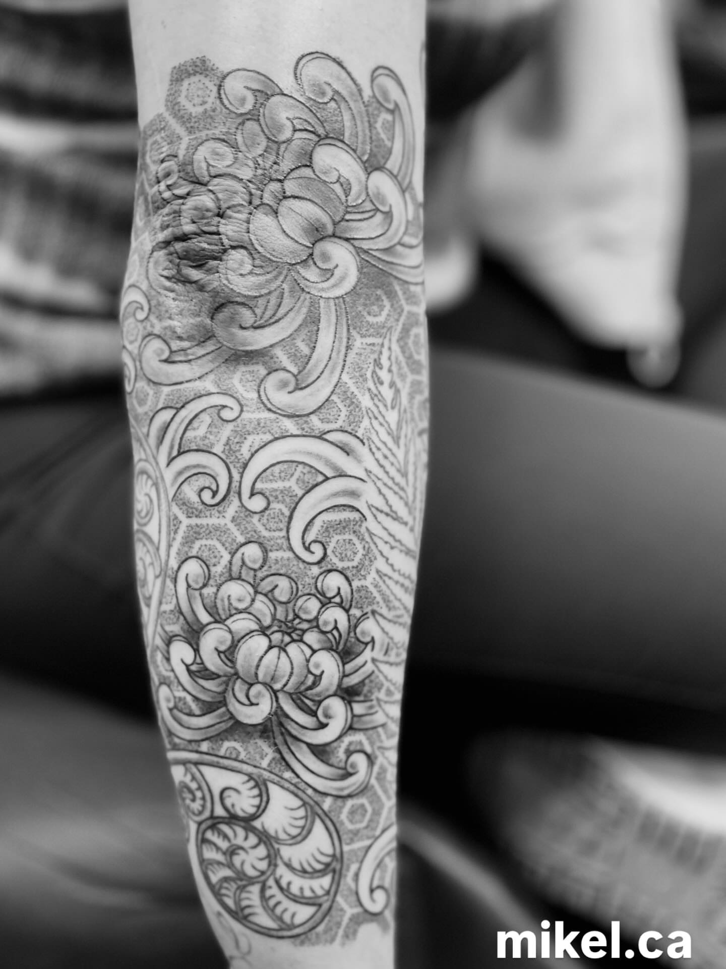 Chrysanthemum dotwork tattoo on the forearm by mikel_tattoosangha
