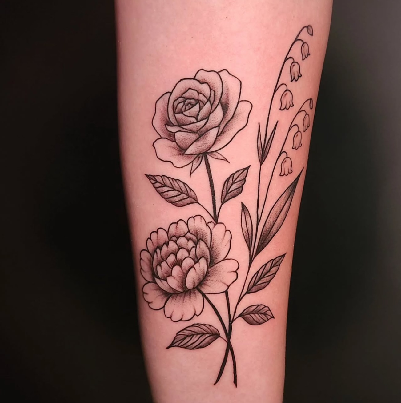 Rose and peony black and grey tattoo on the forearm by Dave Potavin, Erlanger, Kentucky