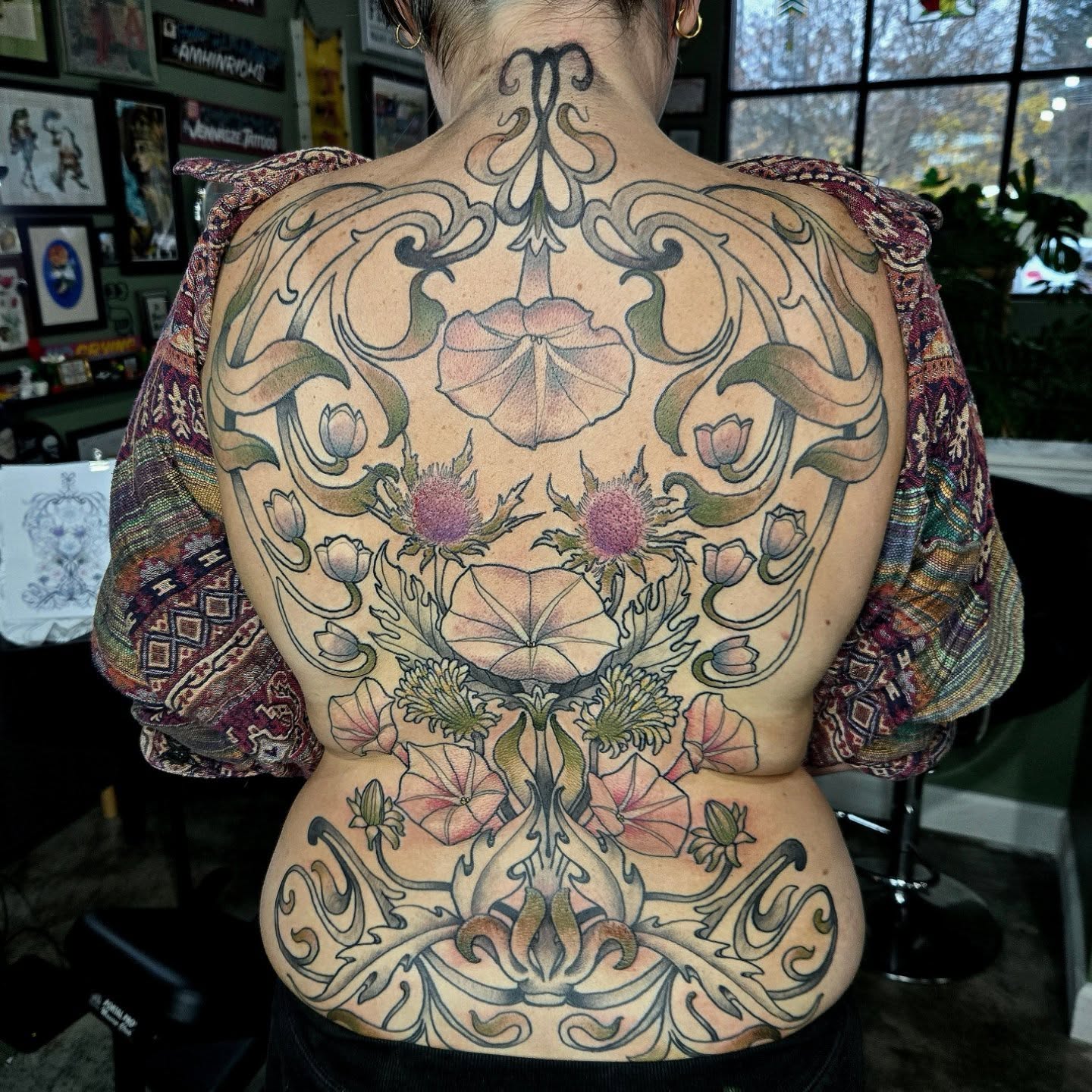 Floral ornamentation ornamental tattoo on the back by Amanda Hinrichs