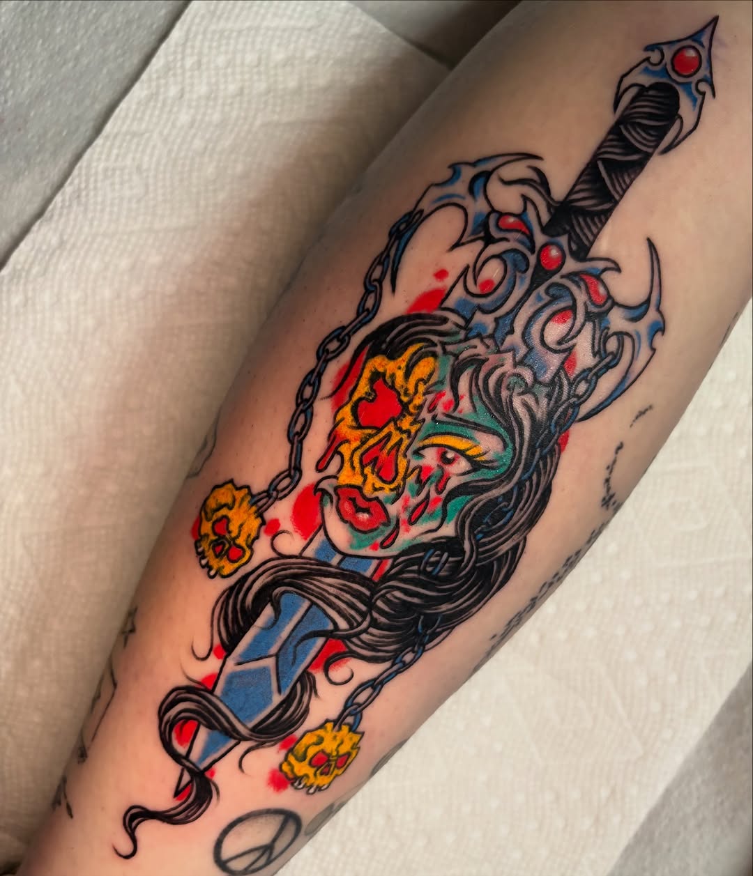 Woman and sword American traditional tattoo on the forearm by Gabi Elia