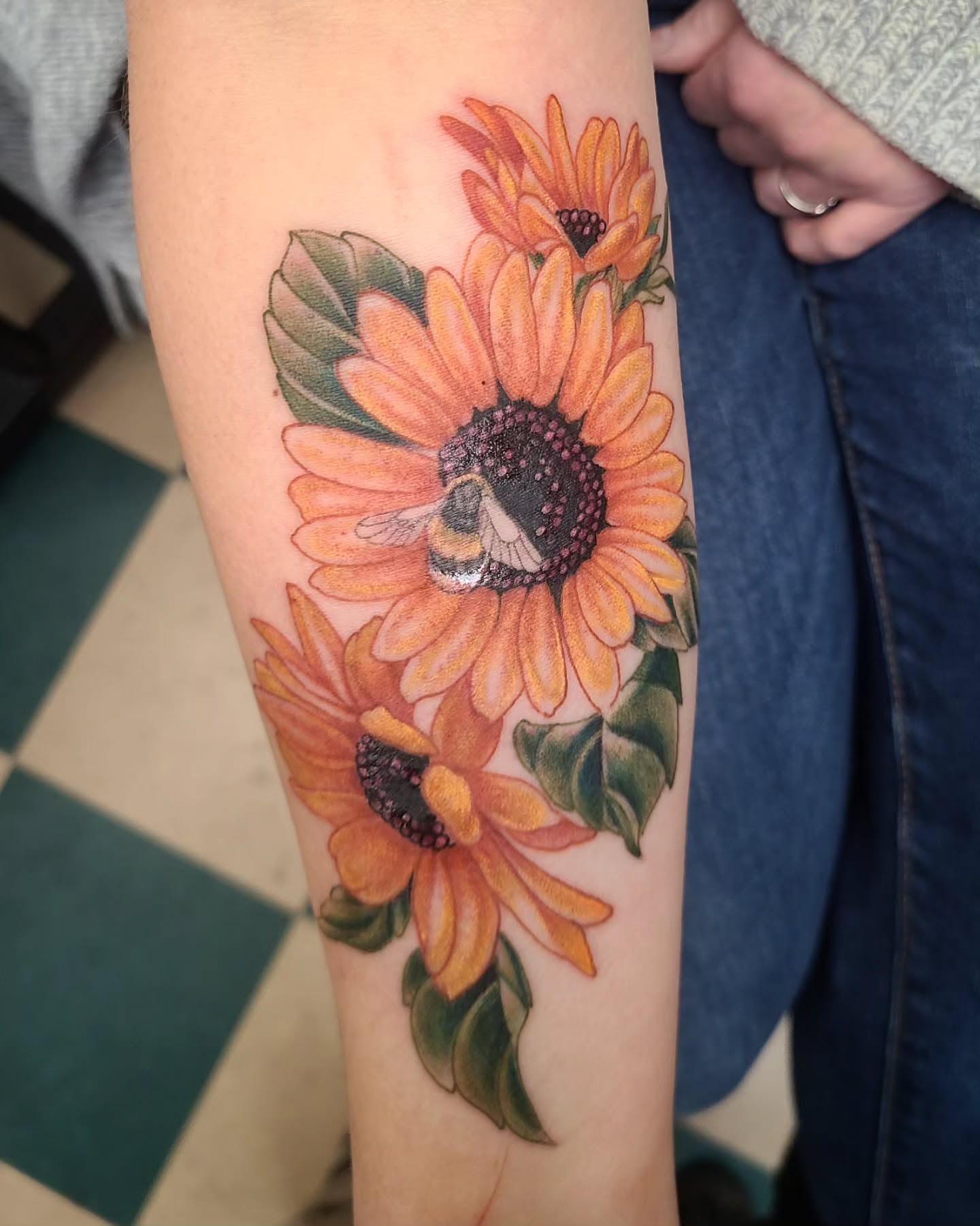 Sunflowers realism tattoo on the forearm by David Vodicka