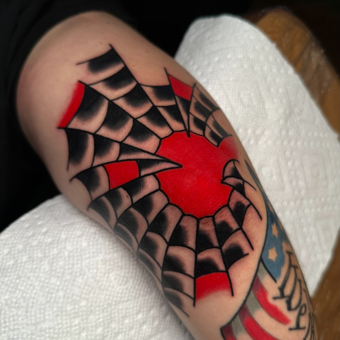 Spiderweb American traditional tattoo on the forearm by Schyler Ames, Canal Fulton, Ohio