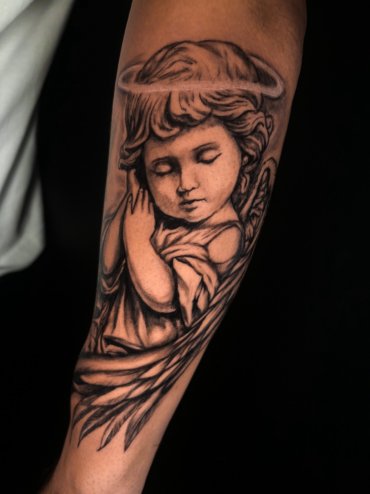 Angel realism tattoo on the forearm by ππ²π΅π π§ - π£πͺπ½π½πΈπΈ ππ»π½π²πΌπ½
