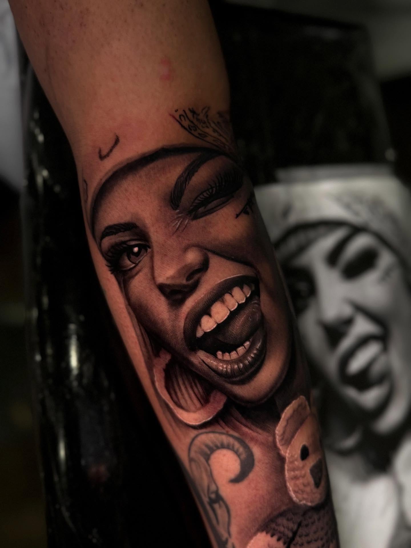 Woman's face realism tattoo on the forearm by Jose Mendoza Torres