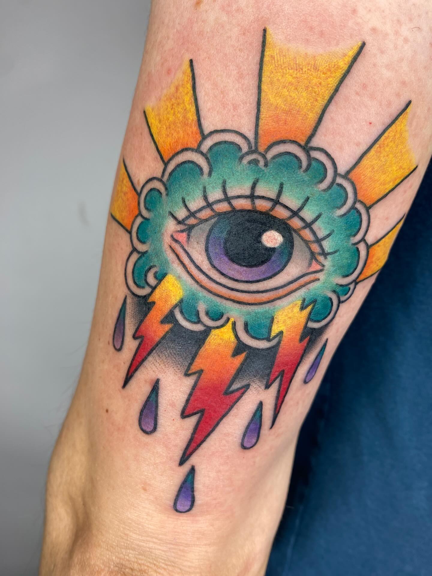 Eye with lightning bolts American traditional tattoo on the forearm by Vivian HavaTattoo, Richmond, Virginia