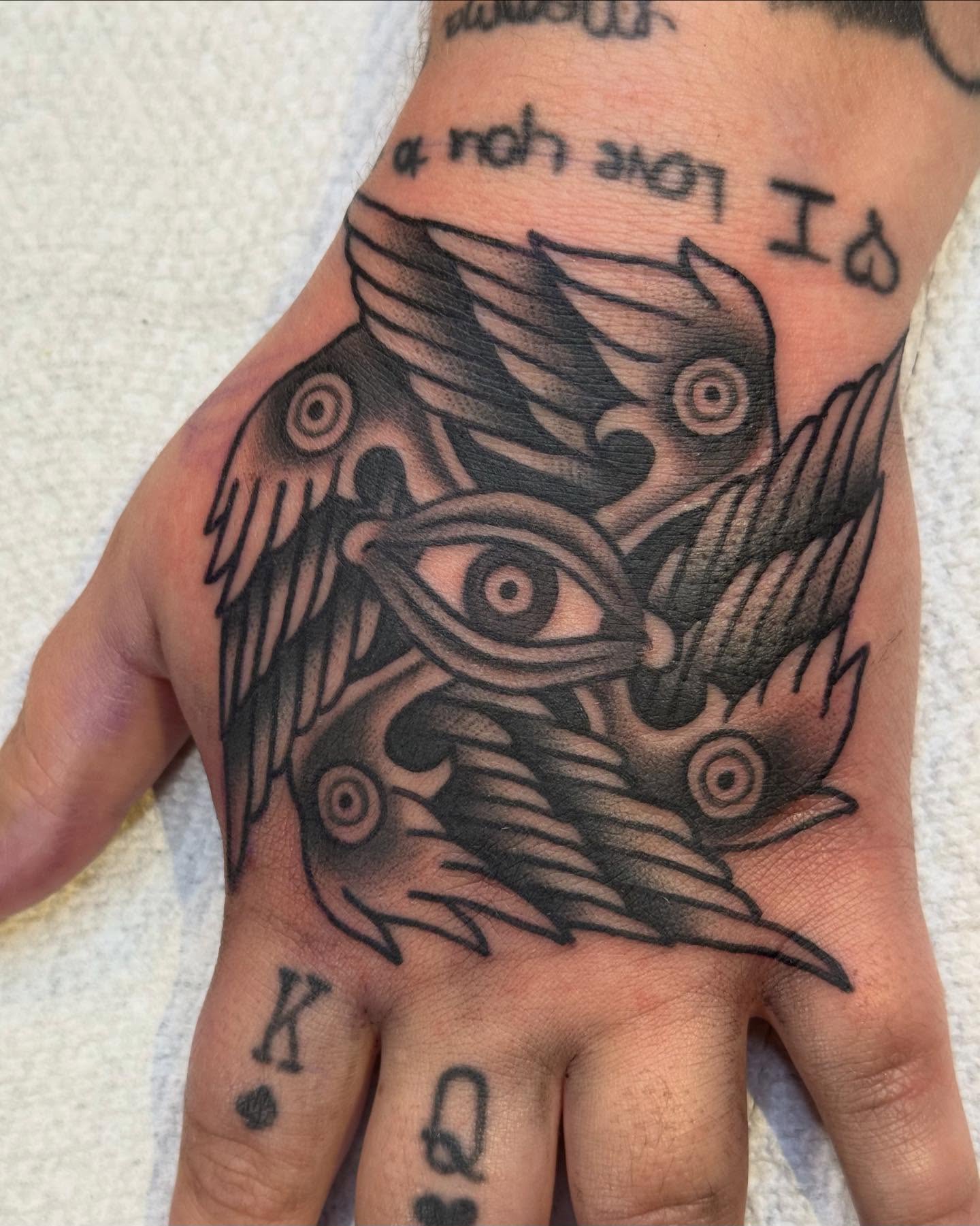 Eye with birds American traditional tattoo on the hand by David Gottschalk