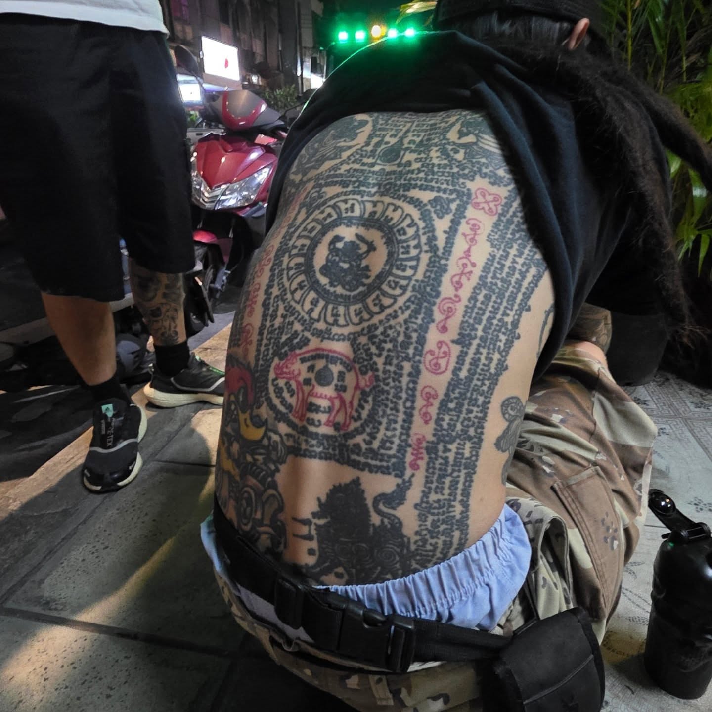 Geometric mandala geometric tattoo on the back by Mitch Braver