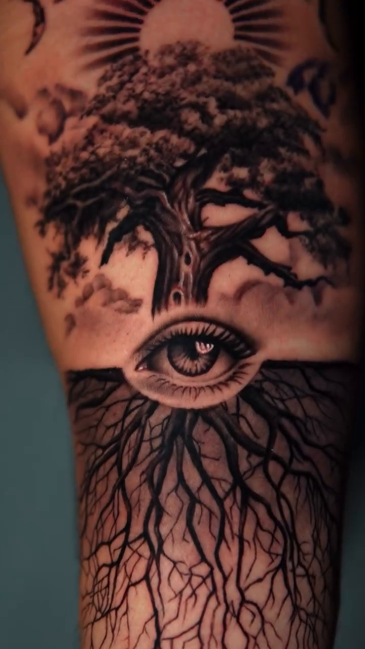 Tree of life and eye realism tattoo by Mariella Elizabeth Paul ππ€