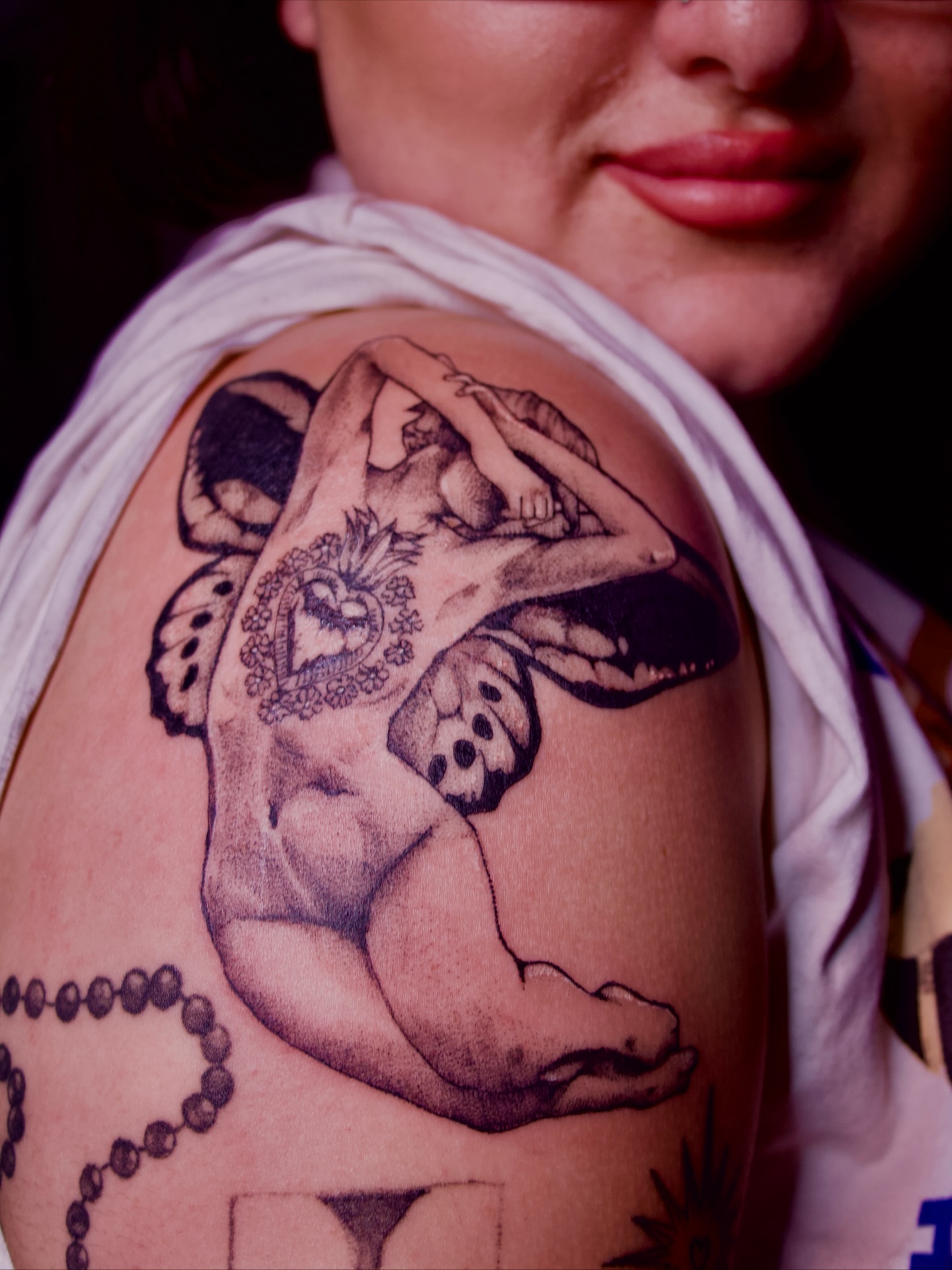 Nude baby with butterfly black and grey tattoo on the shoulder by ✧Lee Ortiz
