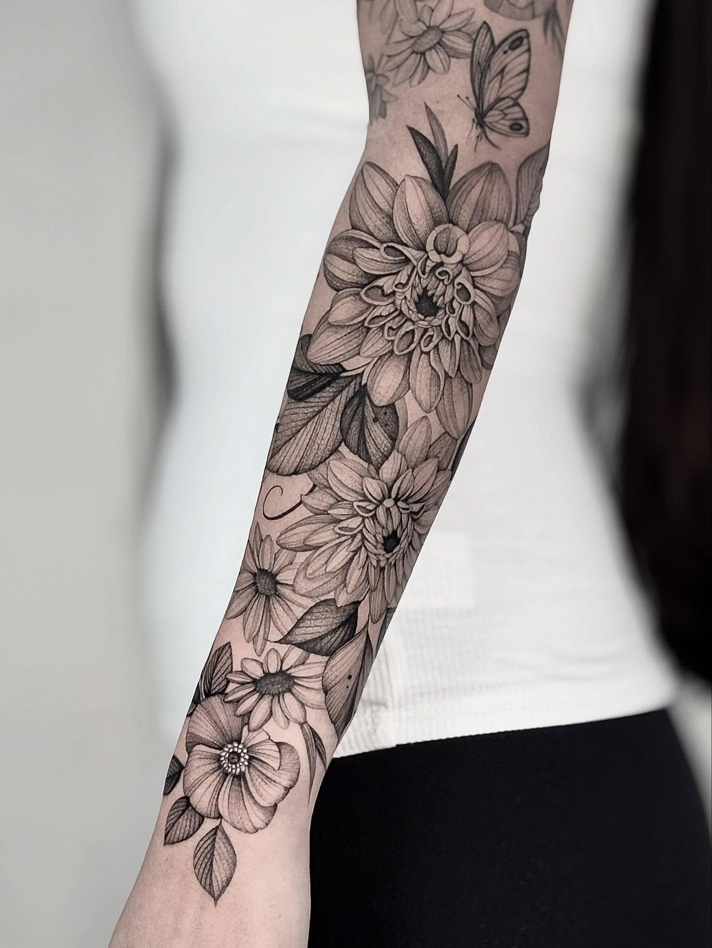 Floral bouquet realism tattoo on the forearm by Brittney Naami, San Francisco, California