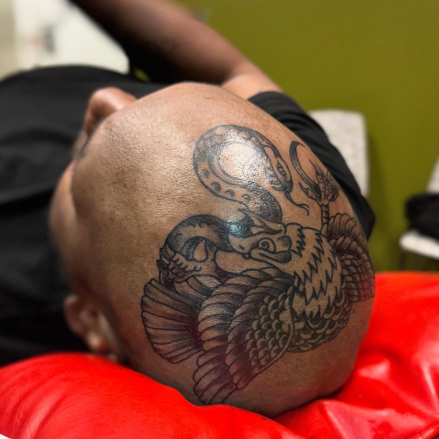 Snake and mask American traditional tattoo on the head by 𝗞𝗮𝘁 𝗕𝗹𝗮𝗻𝗸𝗲𝗻𝘀𝗵𝗶𝗽