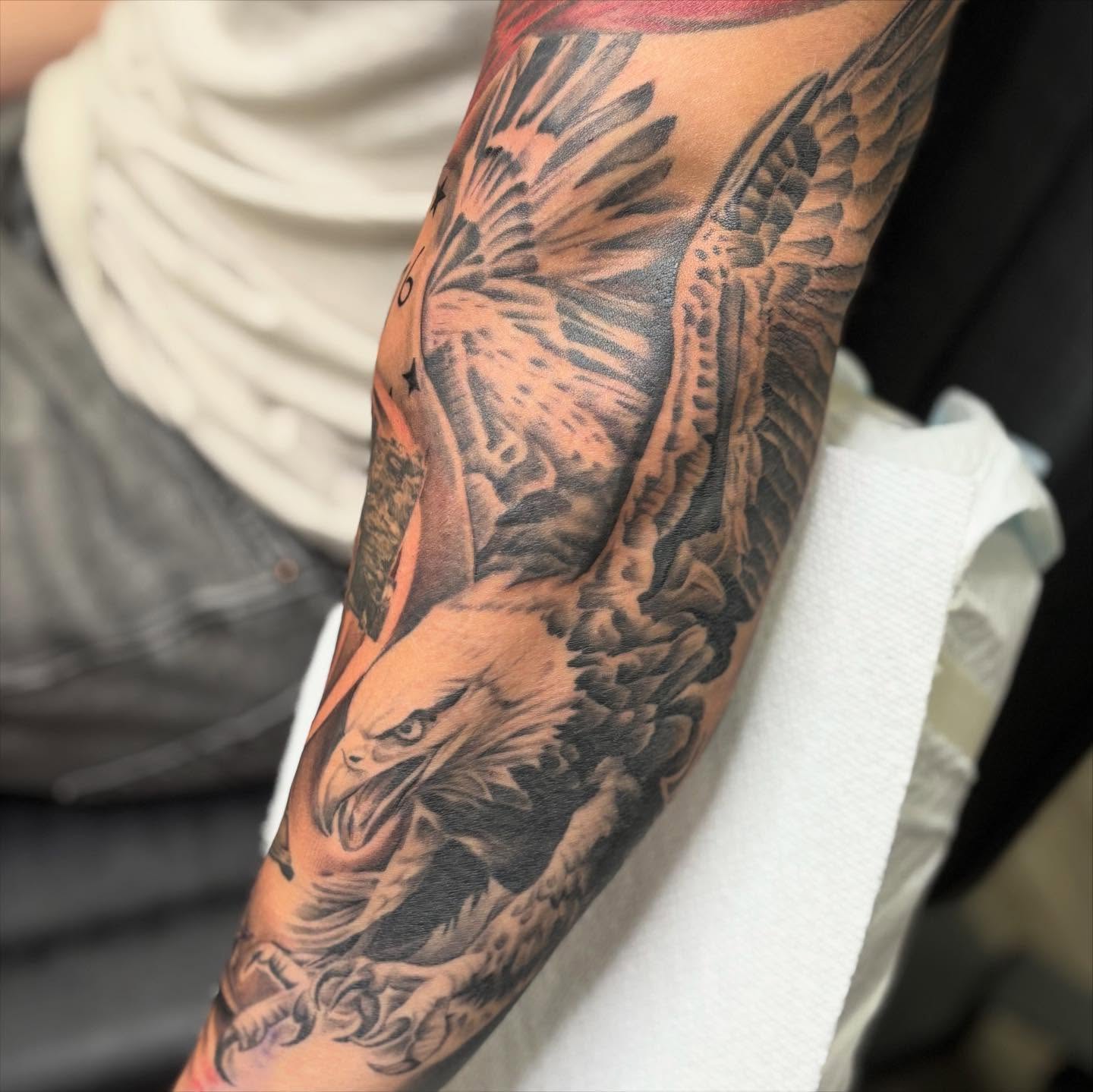 Eagle realism tattoo on the forearm by Amy Kolton