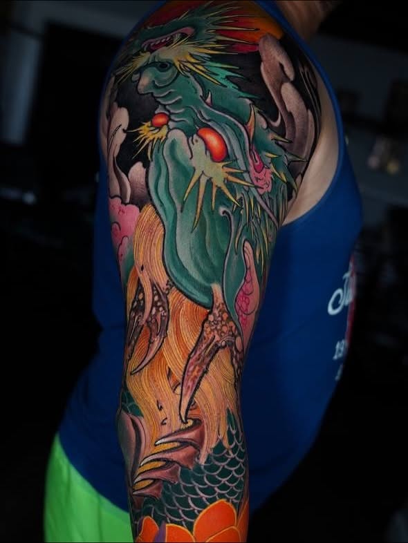 Mermaid japanese irezumi tattoo on the upper arm by Grego Hernandez, Miami, Florida