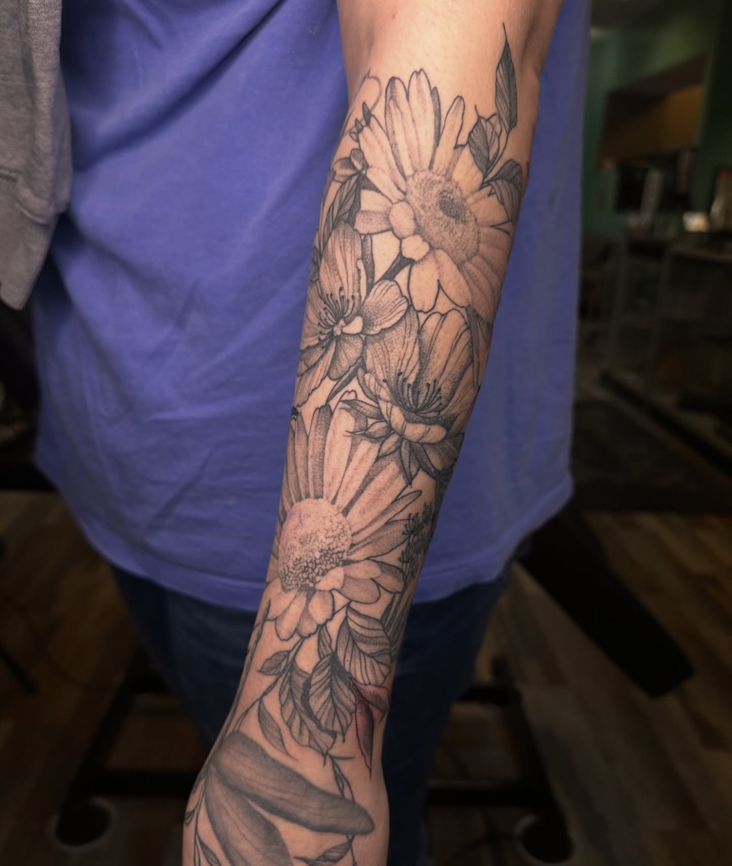 Flowers black and grey tattoo on the forearm by Carly🪲 greensboro tattoo artist, Greensboro, North Carolina