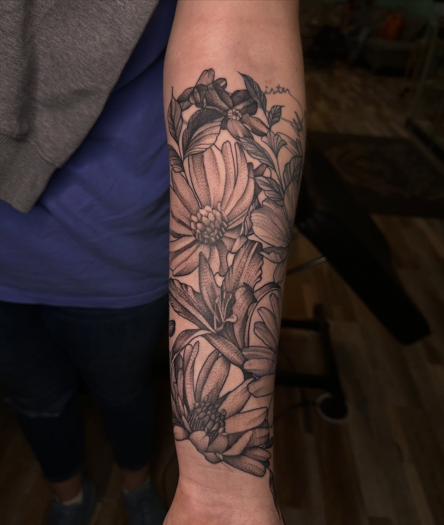 Floral arrangement dotwork tattoo on the forearm by Carly🪲 greensboro tattoo artist, Greensboro, North Carolina