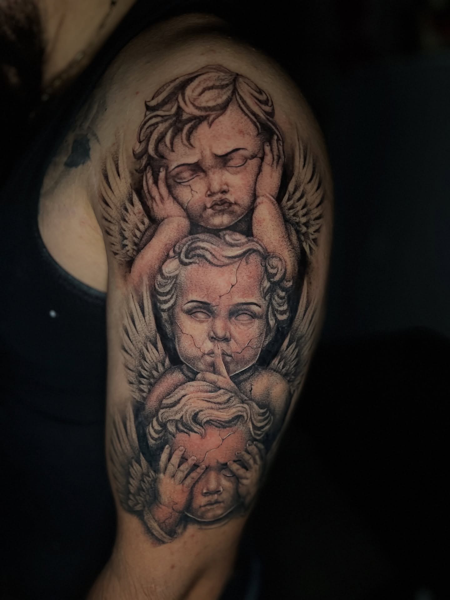 Angels realism tattoo on the shoulder by Dotwork