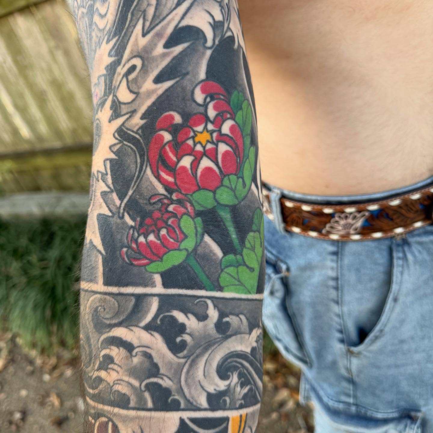 Lotus flower japanese irezumi tattoo on the forearm by Jeremy Justice, New Orleans, Louisiana